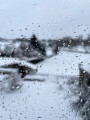 Raindrops on Window with Snowy Backdrop, Guiseley